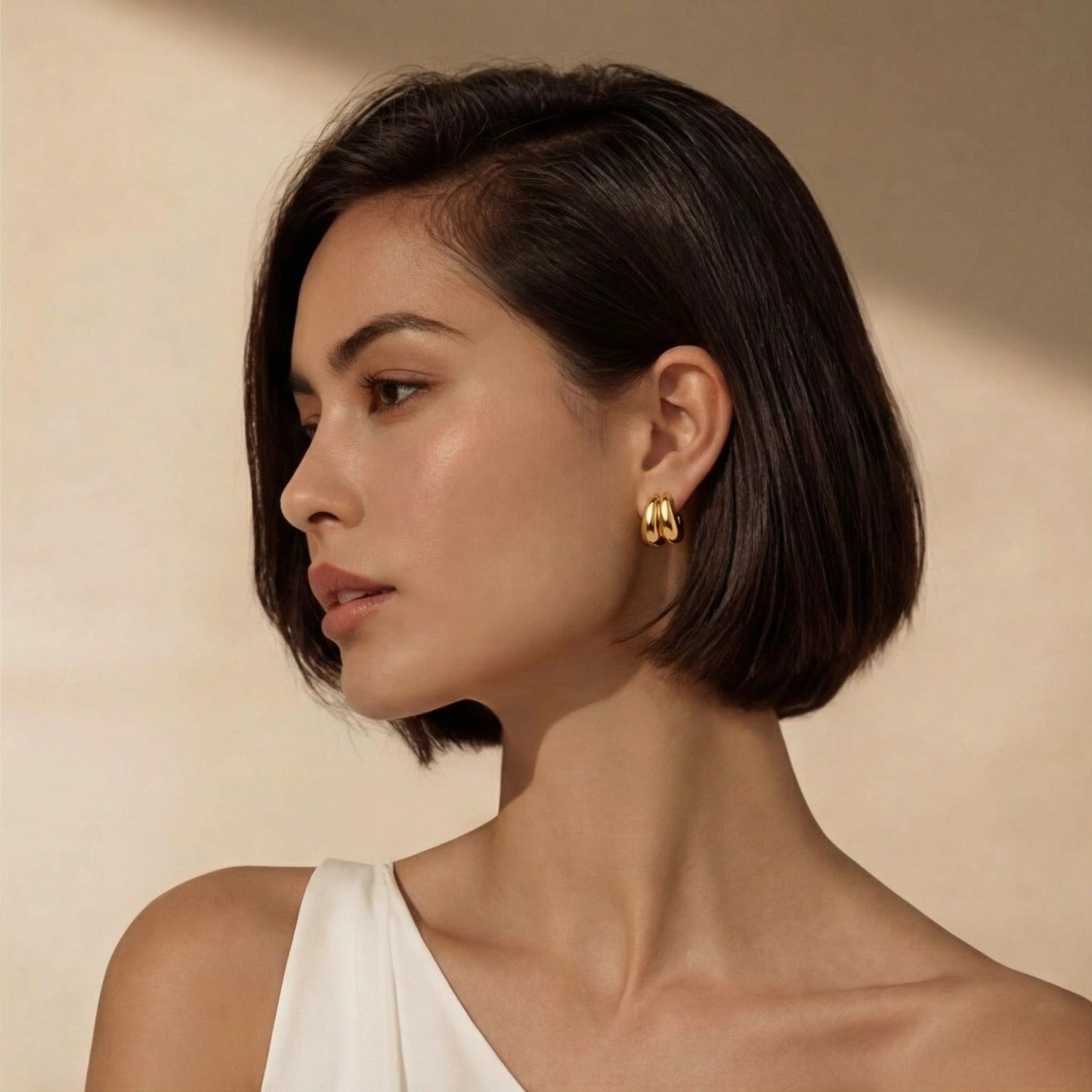 Liquid Gold Sculptural Hoops by Gabriella's Jewels