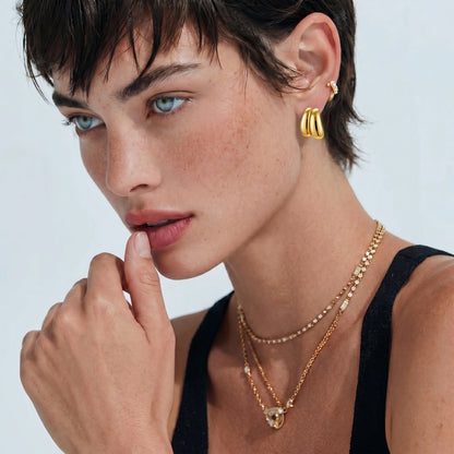 Liquid Gold Sculptural Hoops by Gabriella's Jewels