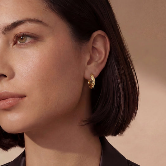 Twisted Gold Huggie Hoops by Gabriella's Jewels